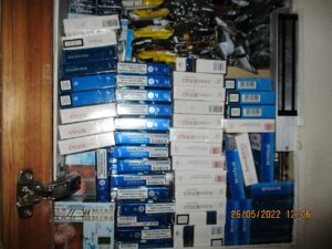 Cupboard filled with tobacco products